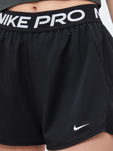 NIKE Loosefit Sporthose 'NP' in Schwarz