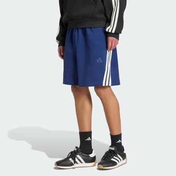 ADIDAS SPORTSWEAR Lużny krój Spodnie sportowe w kolorze niebieski: przód
