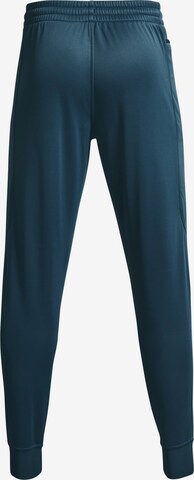 UNDER ARMOUR Tapered Sportbroek in Groen