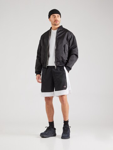 Champion Authentic Athletic Apparel Loose fit Trousers in Black