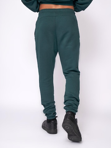 Coupe slim Pantalon de sport 'Essential Jogger' Fortex Fitness en vert