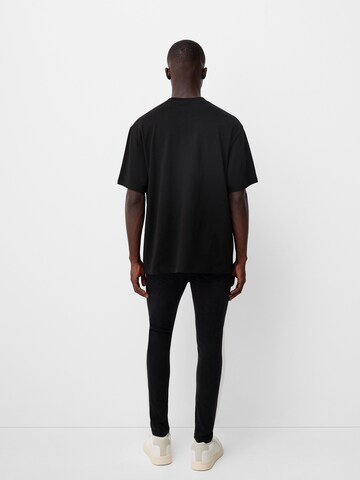 Bershka Skinny Jeans in Schwarz