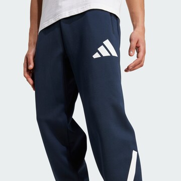 ADIDAS SPORTSWEAR Конический (Tapered) Спортивные штаны 'Z.N.E.' в Синий
