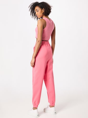 Effilé Pantalon Tommy Jeans en rose