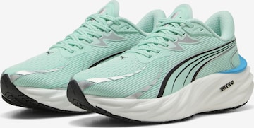 PUMA Running shoe 'Velocity NITRO™ 4' in Green: front