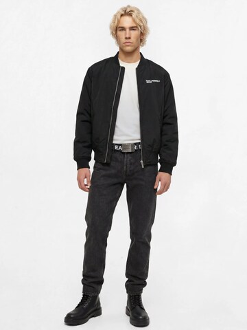 KARL LAGERFELD JEANS Tapered Jeans i sort: forside