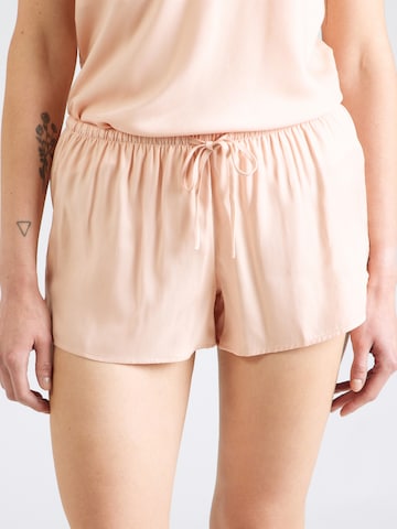 Hunkemöller Spodnie od piżamy w kolorze różowy: przód