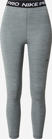 NIKESkinny Sportske hlače - siva boja: prednji dio