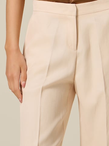 Wide leg Pantaloni di oltre in beige