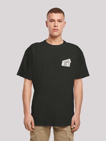 T-Shirt 'Ski Pass Urlaub Berge Winter Schnee' F4NT4STIC en noir : devant
