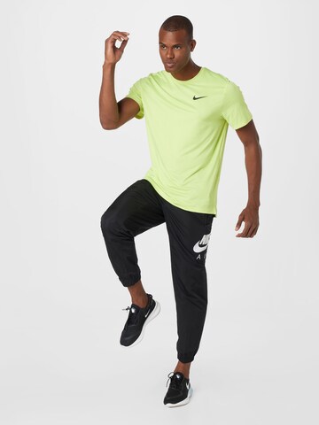 NIKE Performance Shirt 'Pro' in Yellow