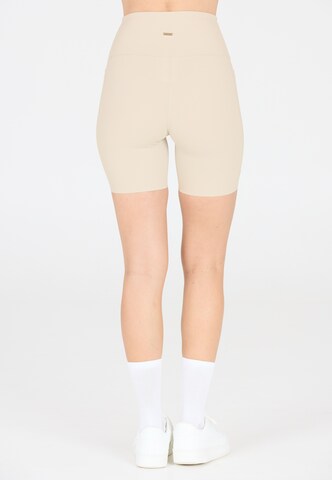 Athlecia Regular Workout Pants 'Aliya' in Beige