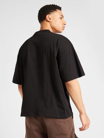 T-Shirt 'PANSY' Pegador en noir