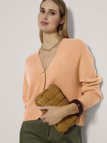 MADELEINE Gebreid vest in Oranje