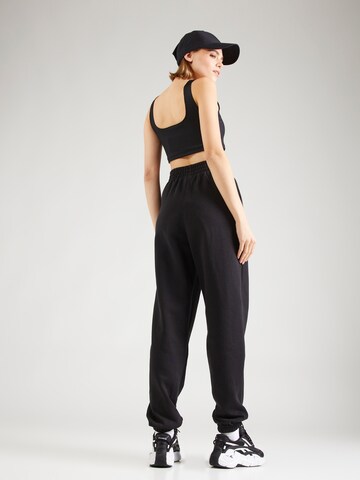 Reebok Tapered Workout Pants 'RIE' in Black