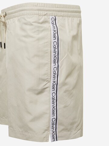 Calvin Klein Swimwear Kratke kopalne hlače | bež barva
