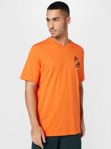 T-Shirt fonctionnel 'Essentials Brandlove' ADIDAS SPORTSWEAR en orange : devant