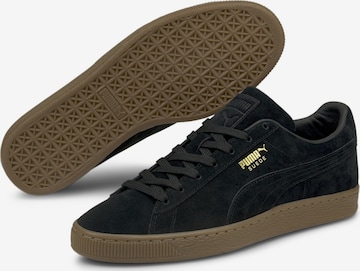 Baskets basses PUMA en noir