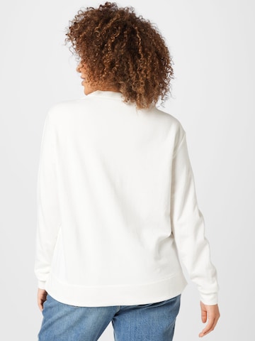 Bluză de molton de la Calvin Klein Curve pe bej