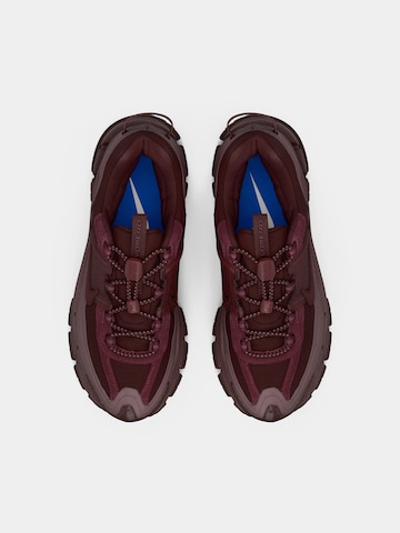 Nike Sportswear Sneaker 'ZOOM VOMERO ROAM' in Rot