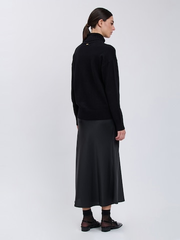 Influencer - Jersey en negro