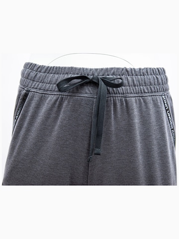 UNDER ARMOUR - regular Pantalón deportivo 'Under Armour Rival Terry' en gris