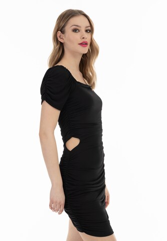 Abito di faina in nero