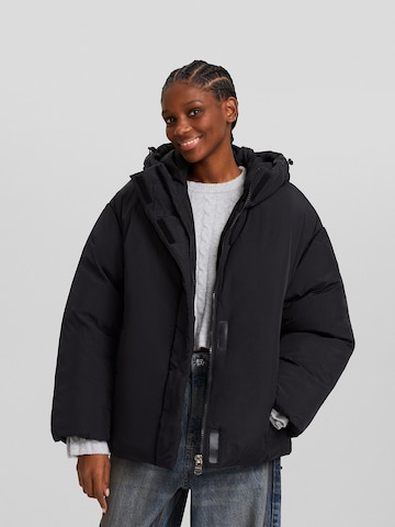 Bershka Winter jacket in Black: front