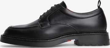 Chaussure à lacets TOMMY HILFIGER en noir : devant