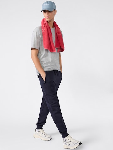 Champion Authentic Athletic Apparel Tapered Byxa i blå