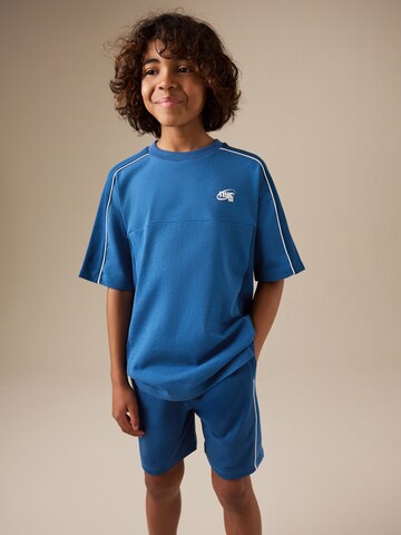 Next Set in Blau: Vorderseite