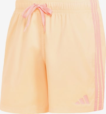 ADIDAS SPORTSWEAR Board shorts in Orange: front