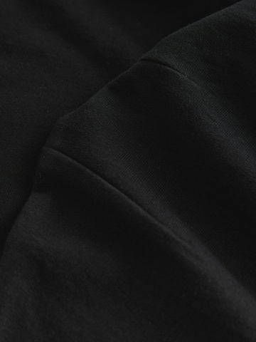 Next - Loosefit Pantalón en negro