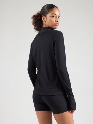 NIKE Sports sweatshirt 'TRAIL' in Black