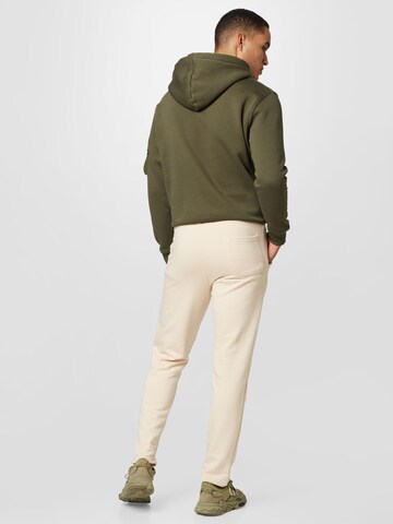 Coupe slim Pantalon ALPHA INDUSTRIES en beige