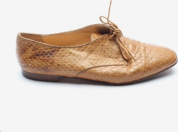 PRADA Flats & Loafers in 38 in Brown: front