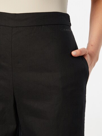 Calvin Klein Široke hlačnice Hlače | črna barva