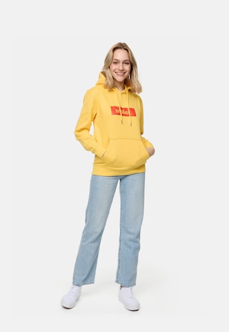 Sweat-shirt 'Buddy' smiler. en jaune