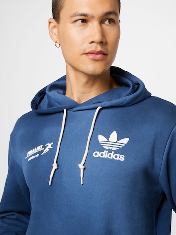 ADIDAS ORIGINALS Sweatshirt 'Graphics Mellow Ride Club' in Blau