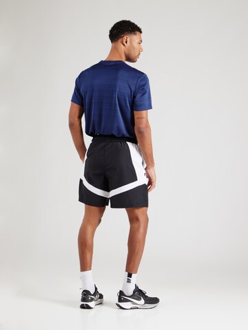 NIKE Loosefit Παντελόνι φόρμας σε μαύρο