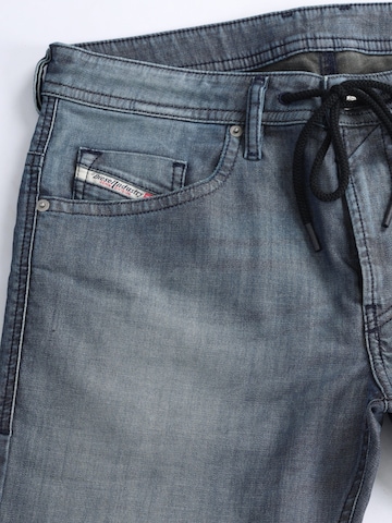 DIESEL Slimfit Jeans 'THOMMER JOGGJEANS Superstretch & Supersoft' in Grijs
