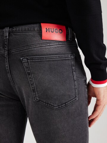 Slimfit Jeans '734' di HUGO in grigio