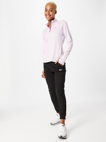 PUMA Sportshirt in Lila