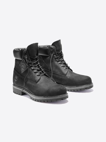 Bocanci cu șireturi de la TIMBERLAND pe negru