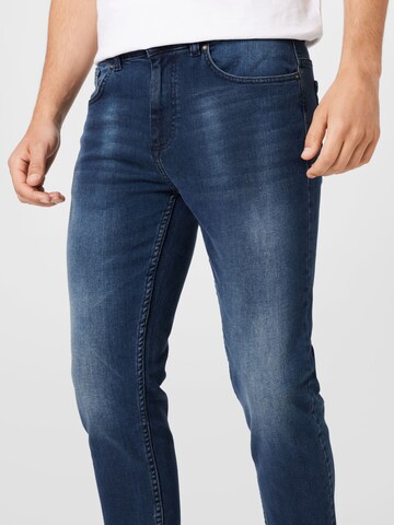 Coupe slim Jean BURTON MENSWEAR LONDON en bleu