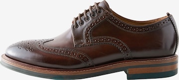 Next Knytsko 'Budapester' i brun: framsida