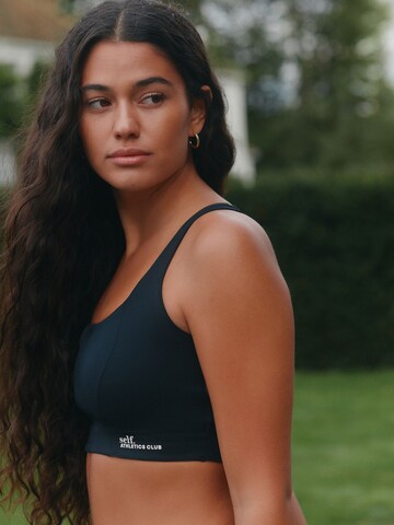 self. Bustier Sport-BH in Schwarz