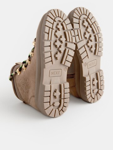 Bottes Next en beige