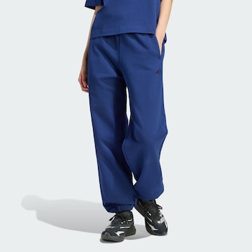 ADIDAS SPORTSWEAR - Tapered Calças de desporto em azul: frente