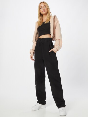 ABOUT YOU Limited Loose fit Trousers 'Rico' in Black